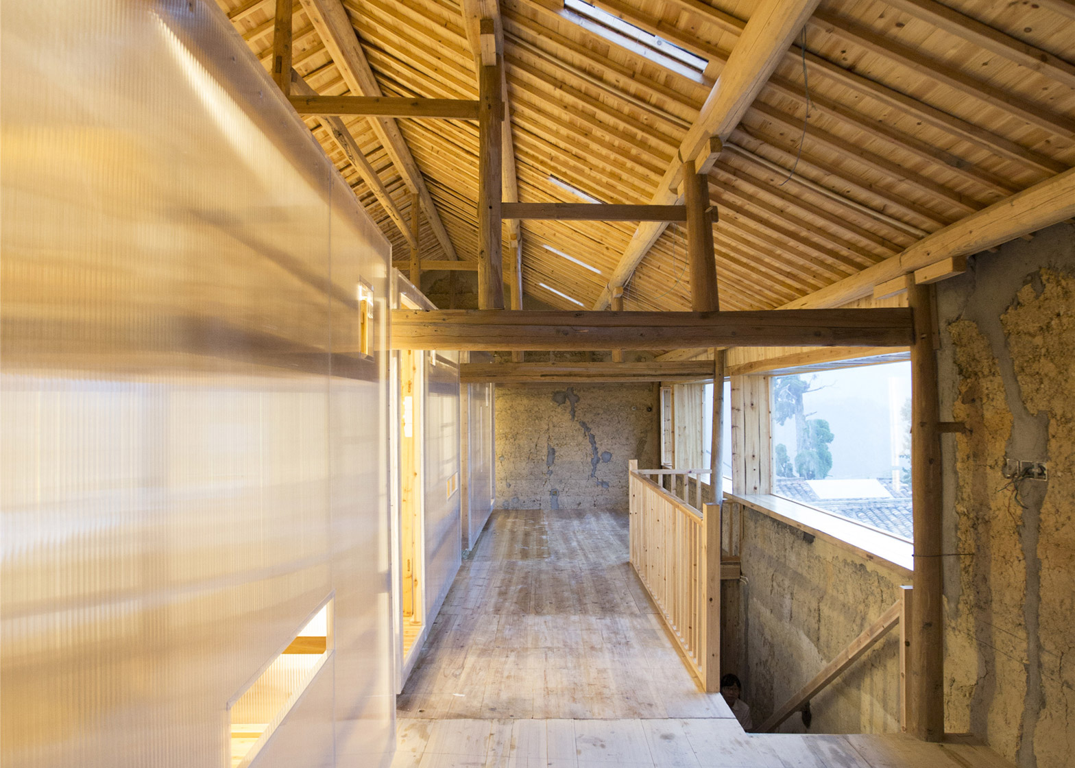 papas-hostel-pingtian-village-joe-fang-zhejiang-province-rammed-earth-house-renovation-international-youth-hostel-rooms-within-rooms-translucent-light_dezeen_1568_2