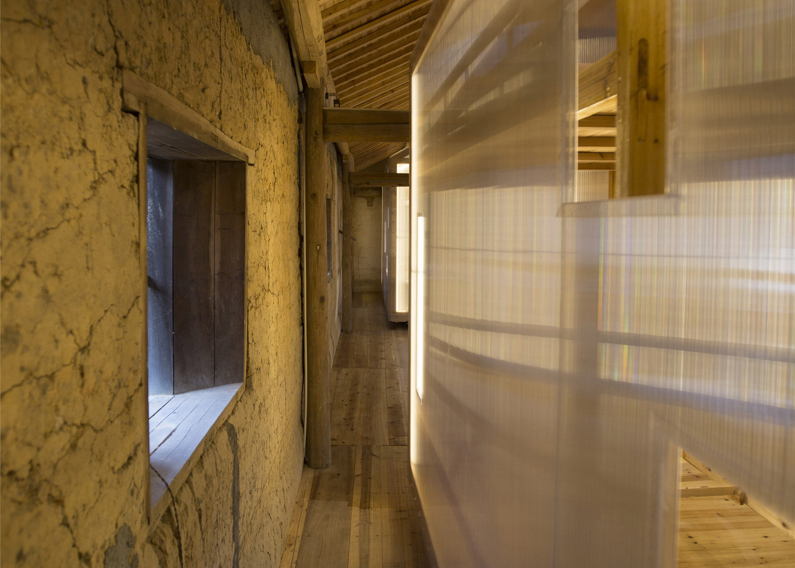 papas-hostel-pingtian-village-joe-fang-zhejiang-province-rammed-earth-house-renovation-international-youth-hostel-rooms-within-rooms-translucent-light_dezeen_1568_6