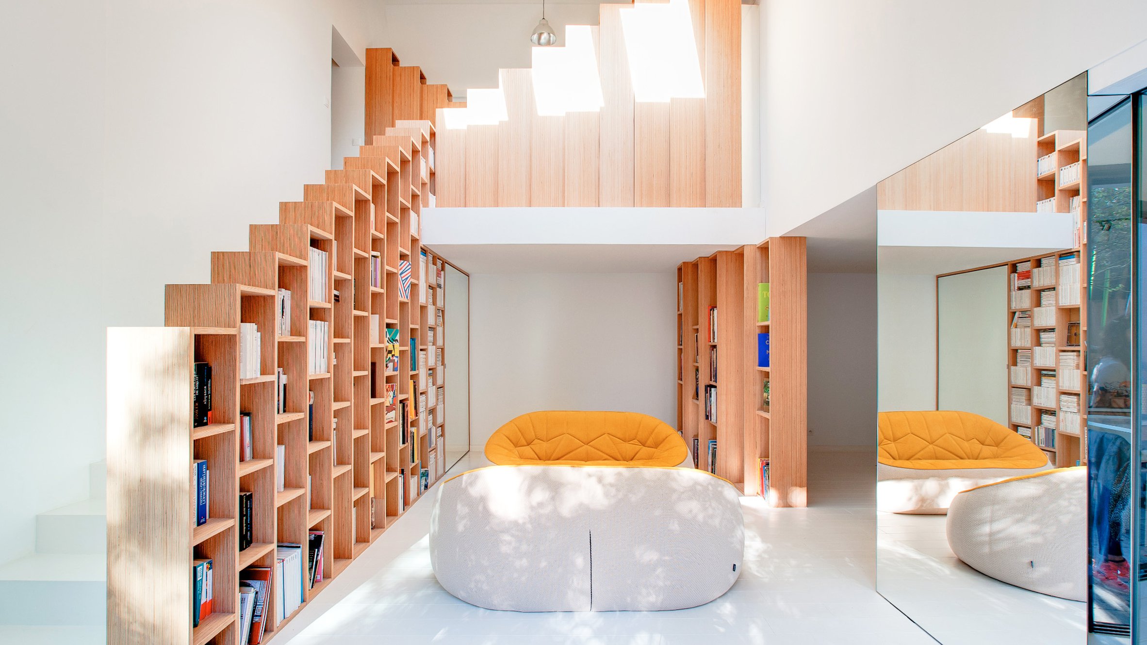 bookshelf-house-andrea-mosca-interior-paris-_dezeen_Hero